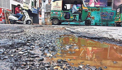 Roads damaged due to incessant rains near Governorpet in city | P Ravindra Babu