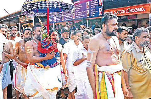 Thantri Kandararu Rajeevararu and melsanthi V N Vasudevan Namboothiri leading the procession carrying the Brahmakalasam as part of Mandalapooja day at Sabarimala Lord Ayyappa temple on Thursday | SHAJI VETTIPURAM