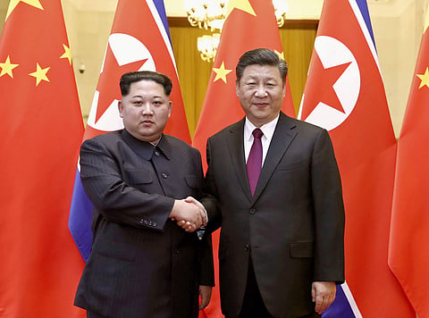 North Korean leader Kim Jong Un (L) and Chinese President Xi Jinping (File Photo | AP)