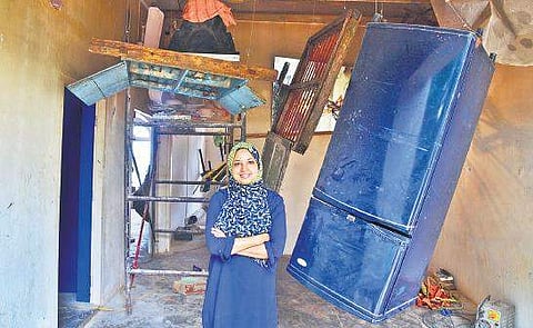 Dhaka-based artist Marzia Farhana in front of her installation at Aspinwall Albin Mathew