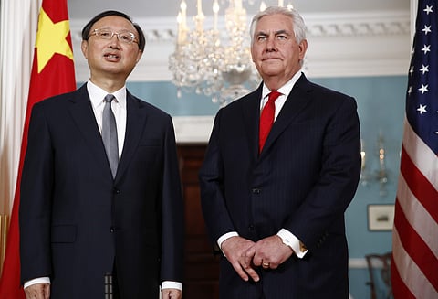 Chinese State Councilor Yang Jiechi speaks as Secretary of State Rex Tillerson | AP