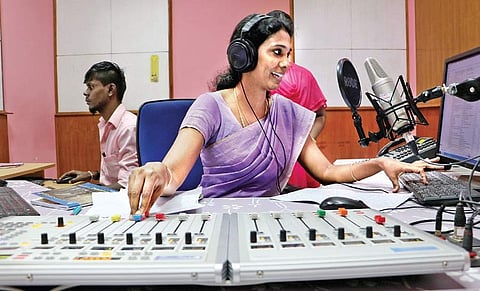 A radio jockey at the Rainbow FM unit of Tiruchirappalli radio station | M K Ashok kumar