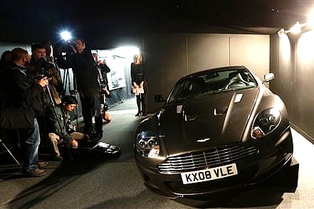The 2008 Aston Martin 6 litre V12 DBS 2 door coupe used by Daniel Craig as James Bond in the movie 'Quantum of Solace' is shown to the media during a press preview at the James Bond movie memorabilia charity auction at Christie's auction house in Londo
