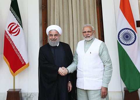 Prime minister Narendra Modi shakes hand with Iran president Dr. Hassan Rouhani before their meeting at Hyderabad house in New Delhi on Saturday. | (Shekhar Yadav | EPS)
