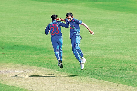 Kuldeep Yadav (L) celebrates with Yuzvendra Chahal after the wicket of JP Duminy during the 1st ODI at Kingsmead on Thursday | BCCI