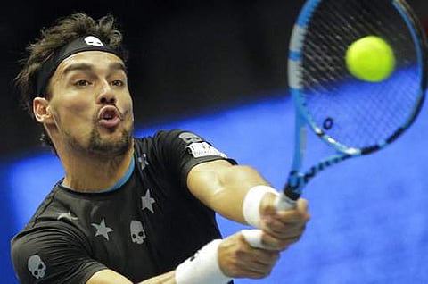 Fabio Fognini of Italy returns the ball to Roberto Bautista of Spain during the St. Petersburg Open ATP tennis tournament semi-final match in St.Petersburg. | AP File