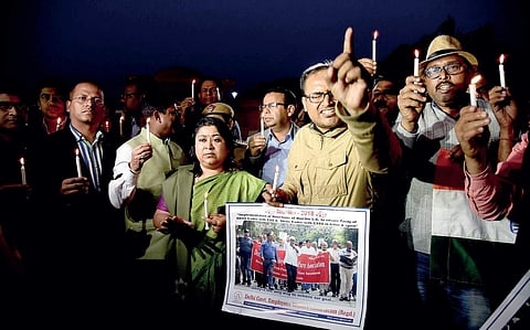 Bureaucrats take out a candlelight rally in the city to protest the alleged attack on Delhi Chief Secretary Anshu Prakash in New Delhi | Parveen negi