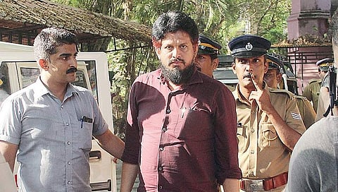 Peace International School managing director M M Akbar being brought to Ernakulam Judicial Magistrate Court in Kochi on Monday | Melton Antony