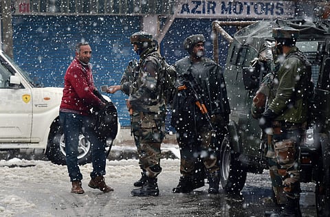 File Photo of Army personnel frisk a man near the site of gun-battle between the security forces personnel and militants at Karan Nagar in Srinagar. | PTI