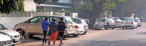Cars parked on the roadside at Delhi's Safdarjung Enclave. The draft policy seeks to discourage on-street parking | Shekhar Yadav