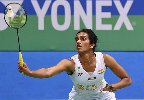 Indian badminton player P.V. Sindhu plays against Thailand's Ratchanok Intanon during the women's singles semifinal match at the Yonex-Sunrise India Open 2018 tournament in New Delhi on Saturday. | PTI