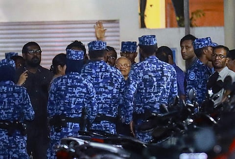 Policemen arrest former Maldives president and opposition leader Maumoon Abdul Gayoom (File | AP)