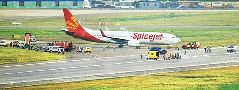 of the SpiceJet flight that was grounded at the Chennai airport; (right) the plane being towed away on Thursday | Pti & Shiba prasad Sahu