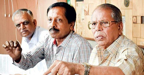 Bangalore Metro Rail Corporation Limited Employees Union vice-president Suryanarayana Murthy and others at a press meet on Friday (EPS | Jithendra M)
