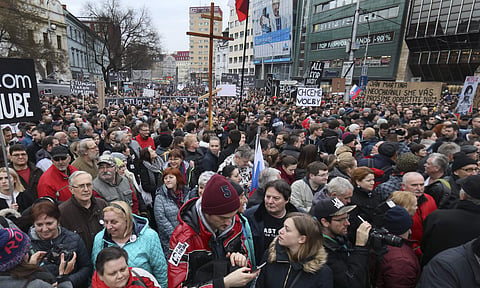 The country-wide protests demand a thorough investigation into the shooting deaths of Jan Kuciak and Martina Kusnirova. (Photo | AP)