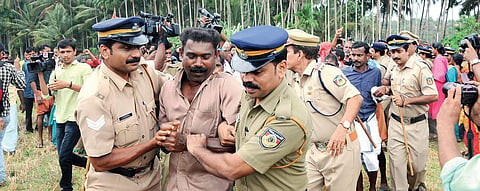 Police forcefully removing the Vayalkkili activists at Keezhattur in Kannur. File | EPS