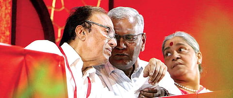 CPI general secretary S Sudhakar Reddy having a word with party national secretary D Raja during the delegates’ meet of the CPI state conference in Malappuram on Thursday. Party leader Annie Raja is also seen | T P Sooraj