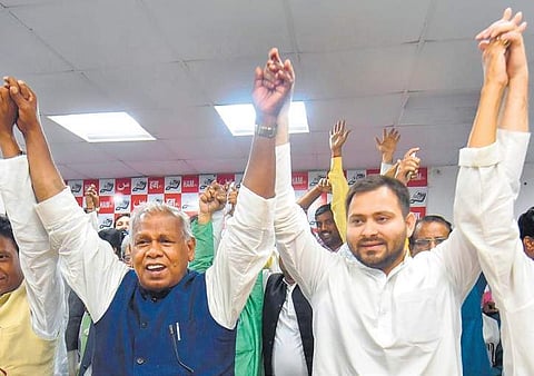 Former Bihar CM Jitan Ram Manjhi with RJD leader Tejashwi Yadav. | PTI