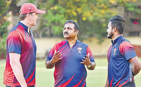 Australia’s pace legend Glenn McGrath (left) with coach M Senthilnathan (centre) at the MRF Pace Foundation in Chennai on Monday | D Sampathkumar