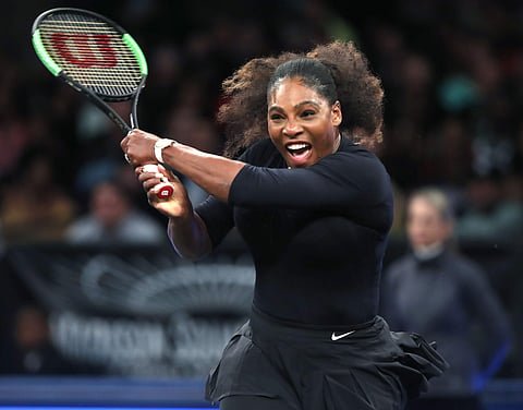 Serena Williams returns to Zhang Shuai during the semi-final round of the Tie Break Tens tournament. | AP