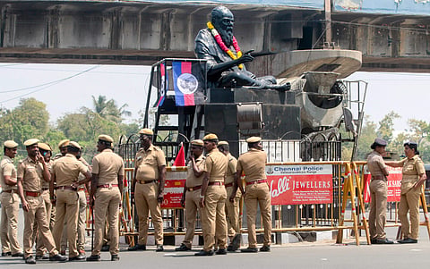 Police personnel guard the statue of rationalist leader E V Ramasamy popularly known as 'Periyar' in Chennai on Wednesday. | PTI