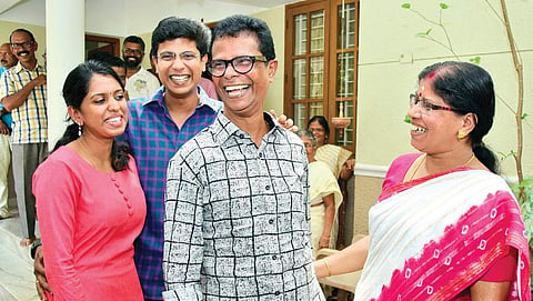 Actor Indrans, along with wife Shantha Kumari, son Mahendran and daughter-in-law Swathi, rejoice at their house in Thiruvananthapuram after he was adjudged the best actor at the 48th Kerala State Film Awards on Thursday (EPS | B P Deepu)