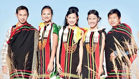 Tetseo Sisters posing in their traditional attire in Mao