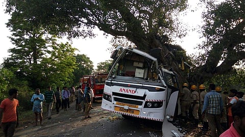 A view of the Private Bus that rammed into tree near Hangal town Nakara Cross on Sirsi-Haveri Road on Monday. (EPS)
