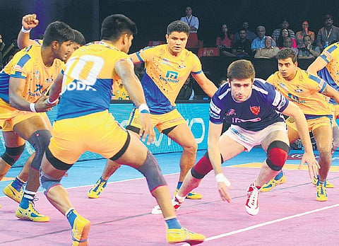 Action from the match between Tamil Thalaivas and Dabang Delhi. | File PTI