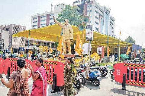 A man dressed like TDP founder late NT Rama Rao greets the public from the dais at Dharma Porata Deeksha at IGMC Stadium on Friday; Balakrishna addresses the gathering | R V K Rao