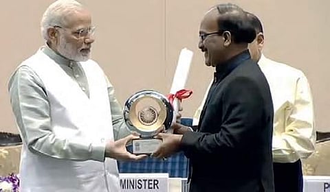 GHMC Commisioner B Janardhan Reddy receiving Prime Minister Award for Excellency from PM Narendra Modi in New Delhi on Saturday | Express