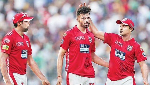 Barinder Sran (c) has used his variations to help KXIP during death overs