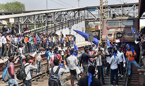 In this file image, Dalit community members stop a train at Gaya railway station during 'Bharat Bandh' call given by Dalit organisations against the alleged 'dilution' of the Scheduled Castes/Scheduled Tribes act in Gaya on Monday. | PTI