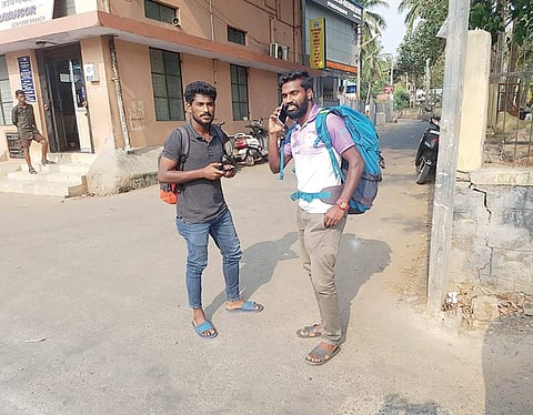 Seesan Selvan (right) and Lijo Siluvacrez after reaching their native place Pozhiyoor