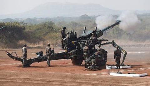 Indian Army soldiers fire a 155mm FH 77B Bofors gun during Exercise Sarvatra Prahar.