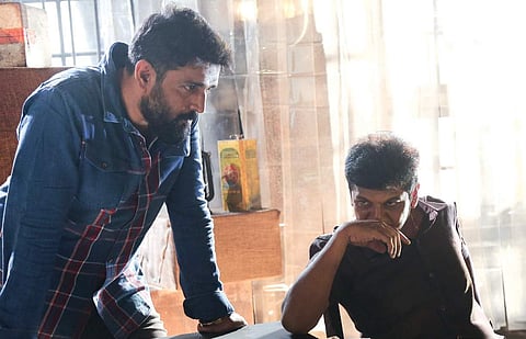Director Ravi Varma and Shivarajkumar.