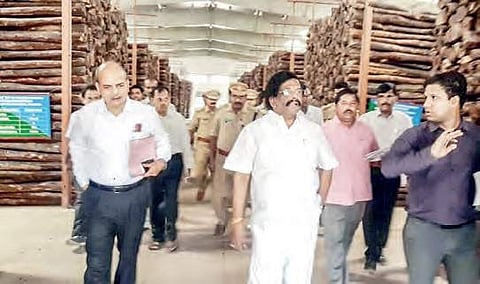 Forest Minister Sidda Raghava Rao inspecting the central red sanders godown in Tirupati on Monday | Express