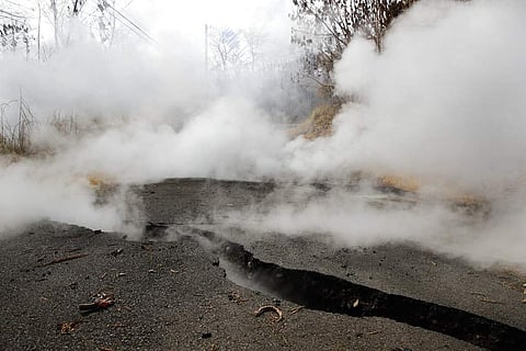 Toxic gases rise from cracks in the Leilani Estates subdivision near Pahoa, Hawaii. | AP