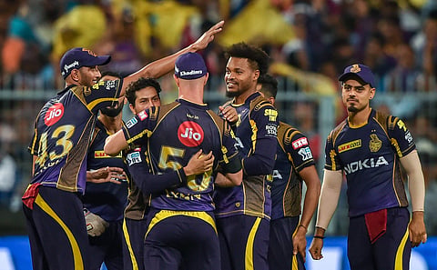 Kolkata Knight Riders bowler Kuldeep Yadav celebrates with his teammates the dismissal of Rajasthan Royals' JC Buttler unseen during their IPL cricket match in Kolkata on Tuesday. | PTI