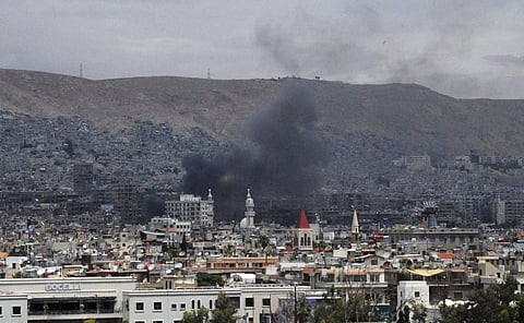 Smoke rises after shelling, apparently by Islamic State fighters, in Damascus, Syria. (Photo | AP)