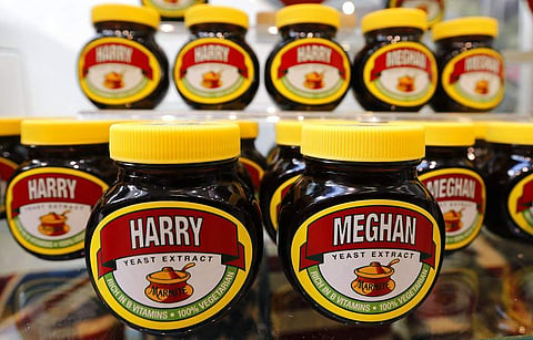 FILE - In this Tuesday, May 15, 2018 file photo Marmite jars with the names of Prince Harry and Meghan Markle on it are photographed on a supermarket shelf in Windsor, England. | AP