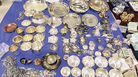 Silver articles and other valuable items seized from the attender in Nellore on Tuesday | Express