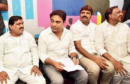 Minister for Municipal Administration KT Rama Rao siting at the bus station after its inauguration, on Tuesday | express