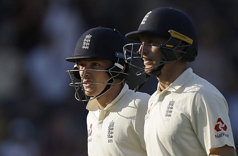 England's Don Bess, left and England's Jos Butler walk from the pitch at the end of play on the third day of play of the first test cricket match between England and Pakistan at Lord's cricket ground in London, Saturday, May 26, 2018. | AP