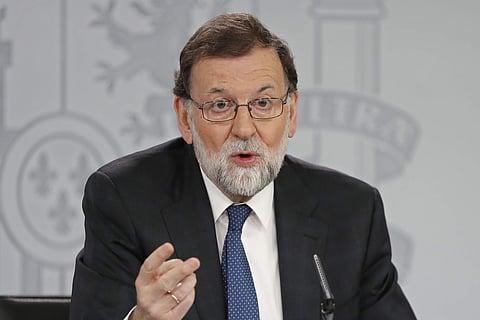 Spain's Prime Minister Mariano Rajoy speaks during a hastily called press conference at the Moncloa Palace in Madrid, Spain, Friday, May 25, 2018. | AP