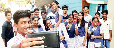 Students taking a selfie after announcement of Class X results | Rakesh Kumar