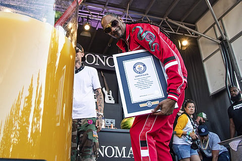 noop Dogg poses after breaking a Guinness World Records for the largest paradise cocktail at the Williams Sonoma Culinary stage at the Bottle Rock Napa Valley Music Festival at Napa Valley Expo. (AP)