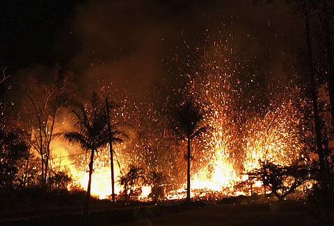 a new fissure erupts in Leilani Estates in Pahoa, Hawaii (Photo | AP)