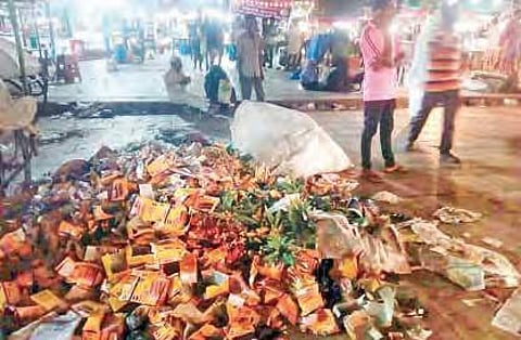 A heap of food waste find shelter in this newly-laid CPP area during the night creating inconvenience for Ramzan revellers | Express photo