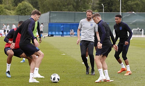 England head coach Gareth Southgate, centre, takes part in a training session for the England team at the 2018 soccer World Cup, in the Spartak Zelenogorsk stadium, Zelenogorsk near St. Petersburg, Russia. (File Photo |AP)